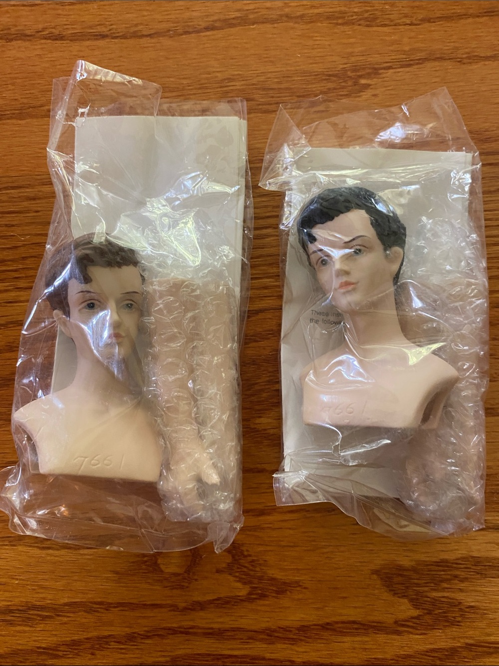 Doll head and arms for angle